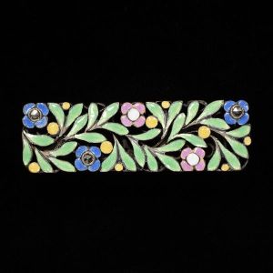 Enamel floral brooch by Bernard Instone, in the collections of the V&A Museum.