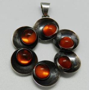 N E From amber pendant.