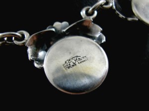 'N E From' in flowing handwriting-like script; '925S DANMARK' in capitals. Photo by Kitty's Antique Jewelry.
