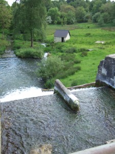 Beyond the dam once stood a massive woollen mill, long-since demolished.