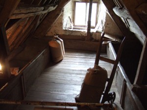 Bins for grain in the bin loft at the top of the Mill.