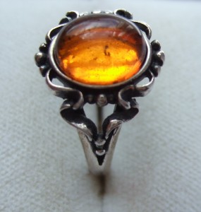 Art Nouveau style Baltic amber and silver ring.