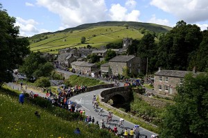 The Peloton passes through the Yorkshire village of Muker. 5 July 2014. Photo by Owen Humphreys/Press Association.