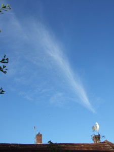 Cirrus clouds (mares' tails) above our village, evening of 15 July 2014, at the same time the circumzenithal arc and sun dog were visible elsewhere in the sky.