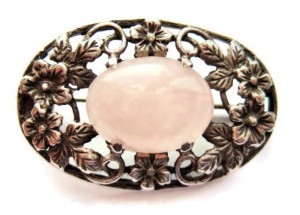 Brooch in the style of Bernard Instone, with rose quartz and silver.