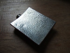 Hand-hammered English pewter hip flask, Arts and Crafts period.