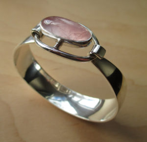 N E From rose quartz modernist bangle. For sale in my Etsy shop: click on photo for details.