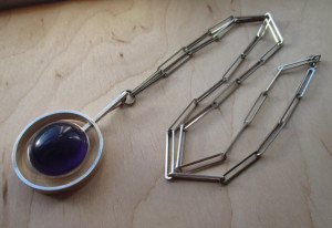 N E From modernist amethyst necklace with paperclip chain. 