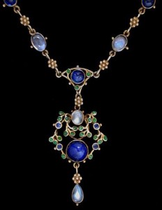 Jessie M King design for Liberty & Co. Gold, sapphire, moonstone and green enamel necklace. Sold by Van Den Bosch.