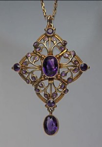 Jessie M King design for Liberty & Co. Gold, amethyst and enamel pendant. Liberty Pattern Book 8605.