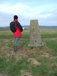 Chap and the drunken trig point on Cold Kitchen Hill.