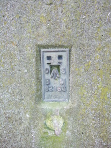 The bench mark on the trig point on Cold Kitchen Hill.