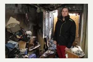 Andrew hamilton-Muspratt, the manager of the Cats Protection charity shop in Gillingham, in the burnt-out shop.