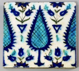Tile for sale at Rosebery's Auctuon, October 2015, described as 'A Persian tile, 19th century, decorated with stylised foliage and leaves, 23 x 23cm'.