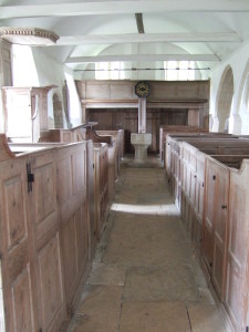 The interior of the church, looking towards the gallery at the north end. The triple decker pulpit is on the left (the south side of the nave).