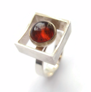N E From Baltic amber modernist ring. For sale in my Etsy shop: click on photo for details.