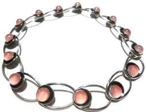 N E From rose quartz necklace. 