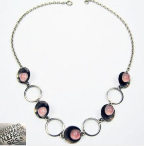 N E From rose quartz necklace.