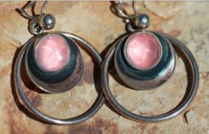 N E From rose quartz earrings.