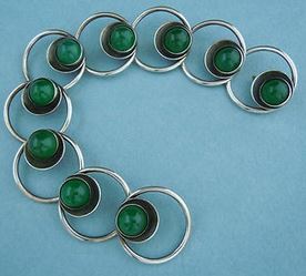 N E From chrysoprase bracelet.