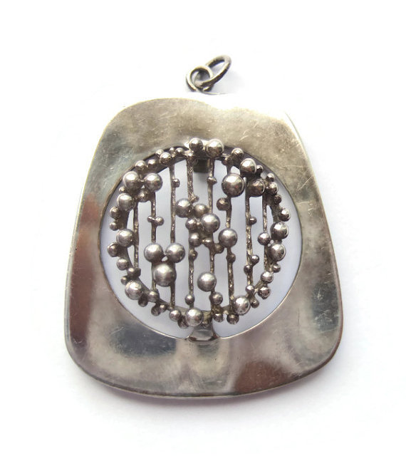 Sterling silver pendant with granulated design. Imported to London , 1973. 