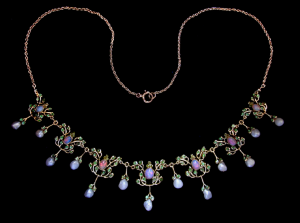 Jessie M King. Opal, peridot, baroque pearl and enamel necklace, c. 1900. Sold by Van den Bosch..