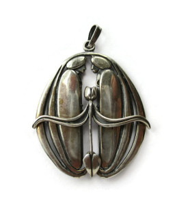 Vintage Charles Rennie Mackintosh design pendant with figures and cicely leaf.