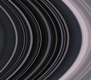 Saturn's rings, photographed by the Cassini orbiter. Photo by NASA, cropped and flipped 180 degrees by me to match my ring.