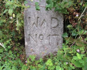 A War Department marker from the Second World War sea defences.