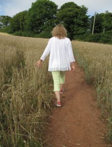 My sister doing her best Maximus Decimus Meridius impression in the barley field.