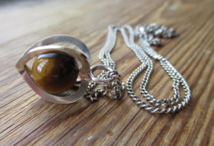 Tiger's eye trapped bead pendant by Elis Kauppi for Kupittaan Kulta. Coming soon to my Etsy shop.