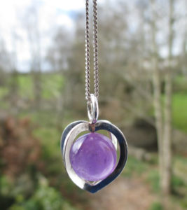 Caged amethyst pendant necklace, by Elis Kauppi of Kupittaan Kulta, Finland. 